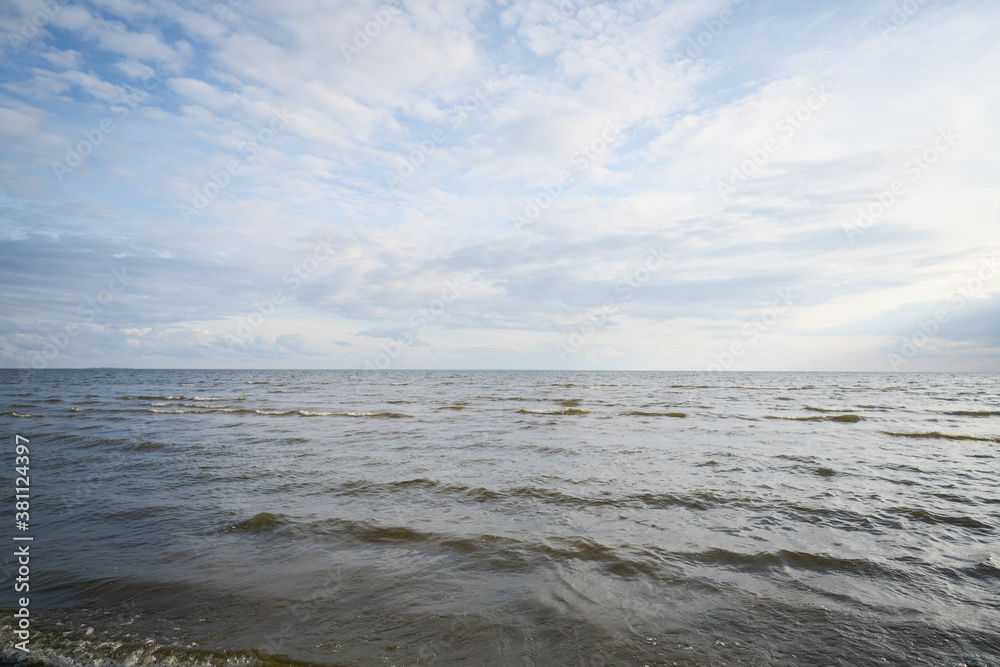 gulf of finland beach with shallow water on a cloudy day