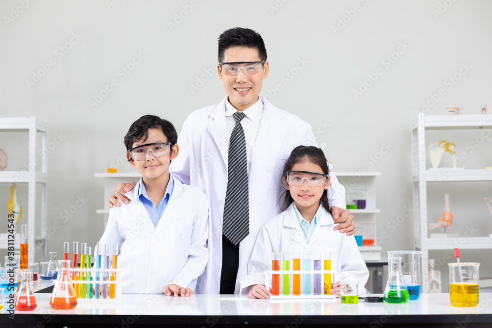 portrait child students and science teacher in laboratory classroom portrait child students and science teacher in laboratory classroom
