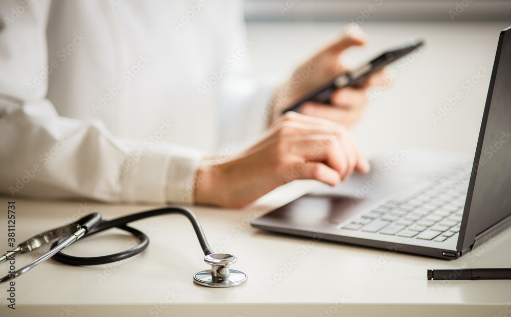 hands of doctor working on laptop tele medicine concept hands of doctor working on laptop tele medicine concept