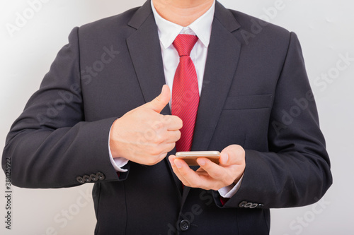 Businessman use smart phone while another hand garentee new smartphone, front view. Business concept.