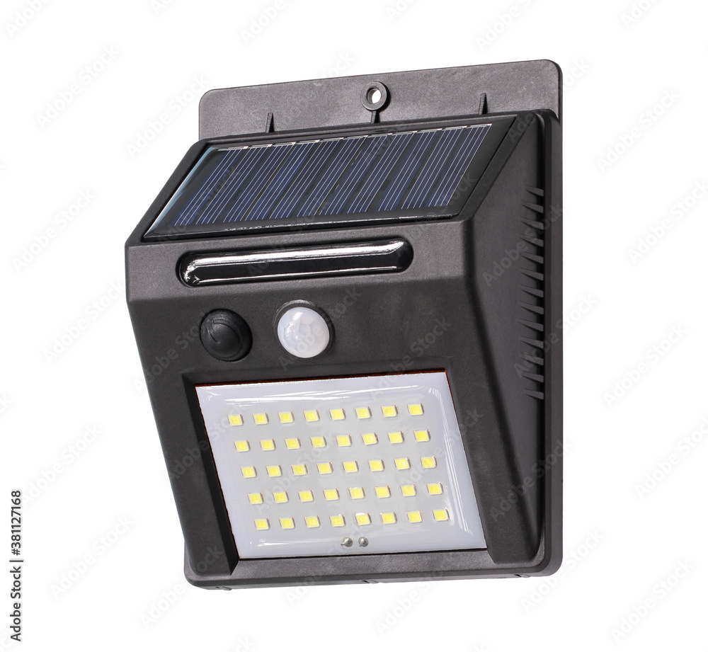 Solar motion sensor led wall light (with clipping path) isolated on white background Solar motion sensor led wall light (with clipping path) isolated on white background