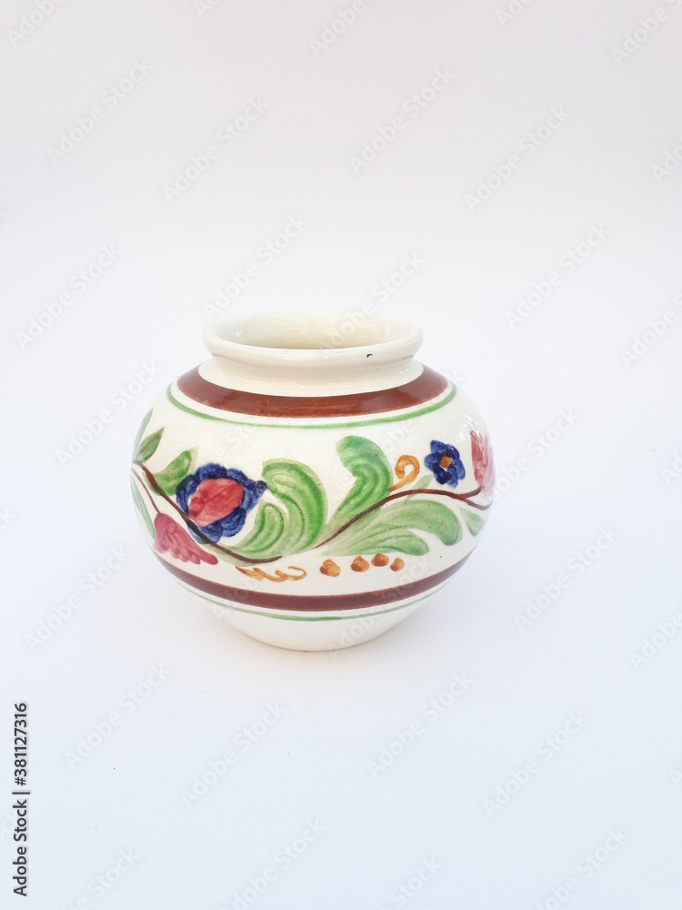 Vintage ceramic vase with folk art pattern -isolated