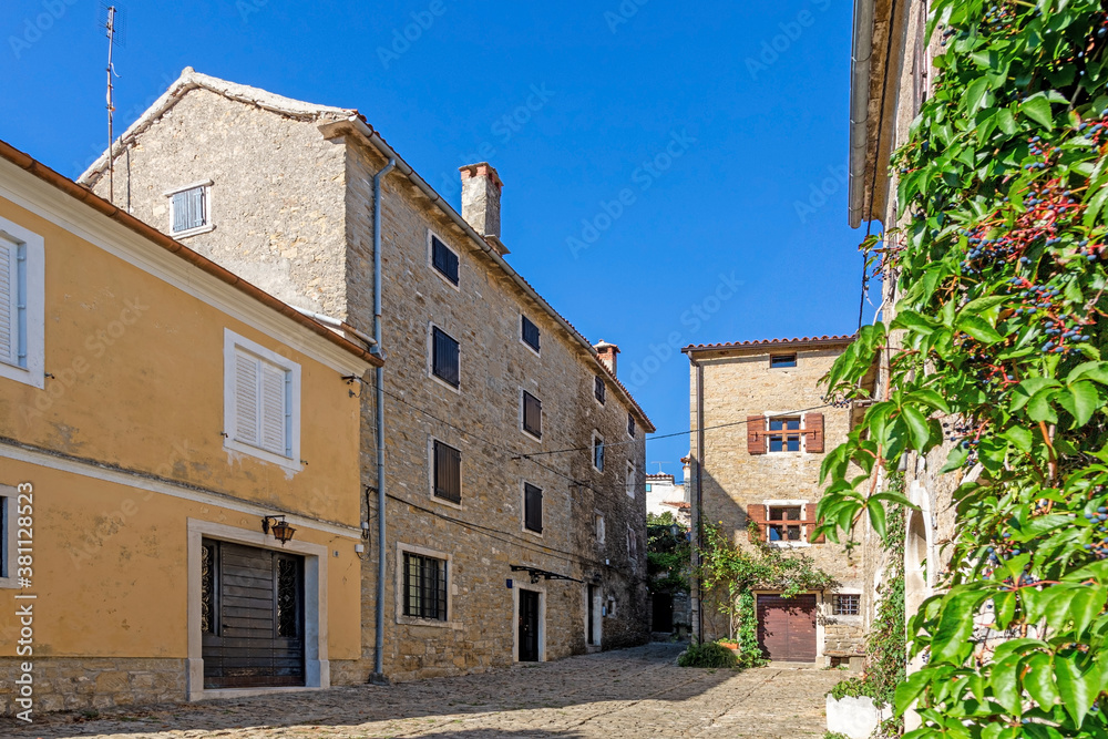 Typical street scene of the medieval town of Groznjan on the Istrian peninsula without people