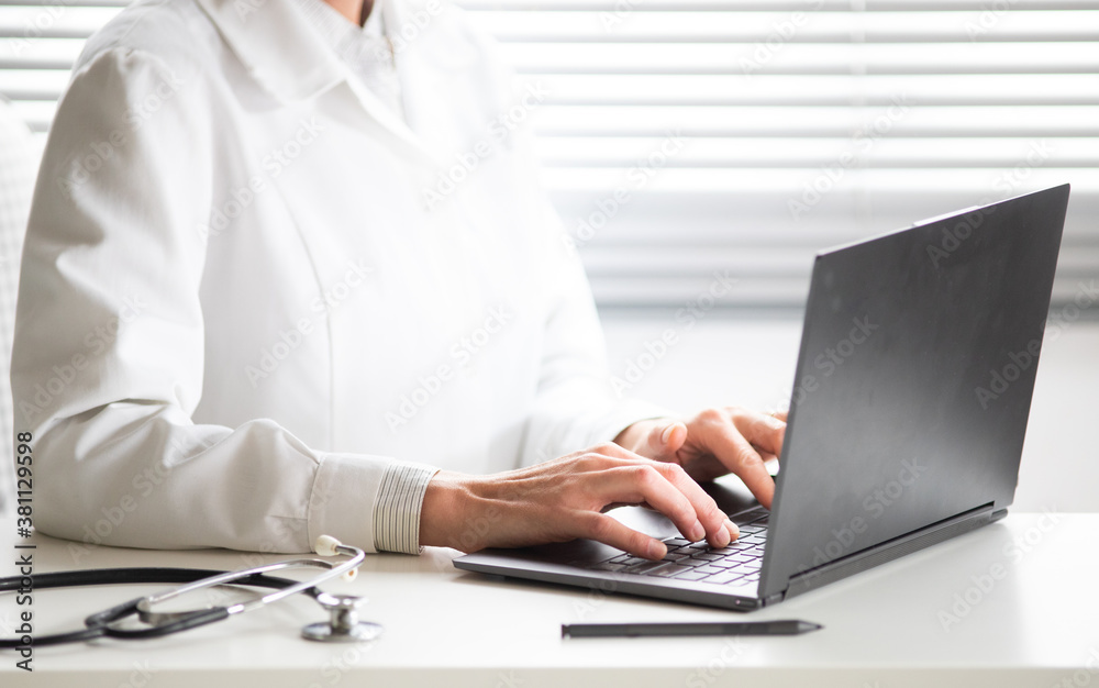 hands of doctor working on laptop tele medicine concept hands of doctor working on laptop tele medicine concept
