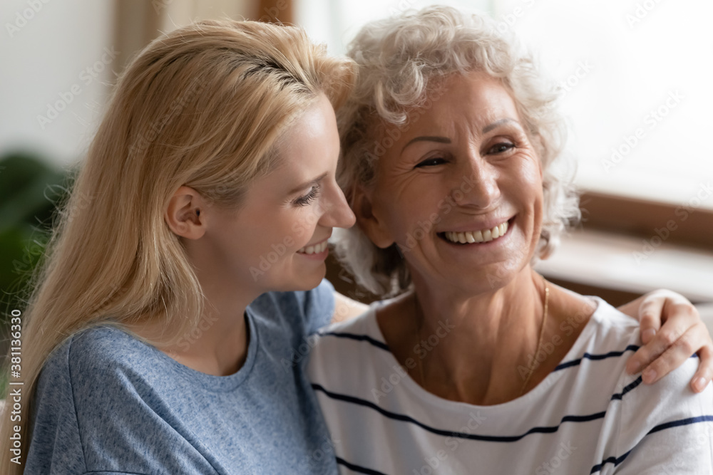 I have always looked up to you, granny. Smiling young female grown grandkid gently embracing shoulders of happy glad elderly hoary grandma, millennial daughter shows support and care to senior mother I have always looked up to you, granny. Smiling young female grown grandkid gently embracing shoulders of happy glad elderly hoary grandma, millennial daughter shows support and care to senior mother