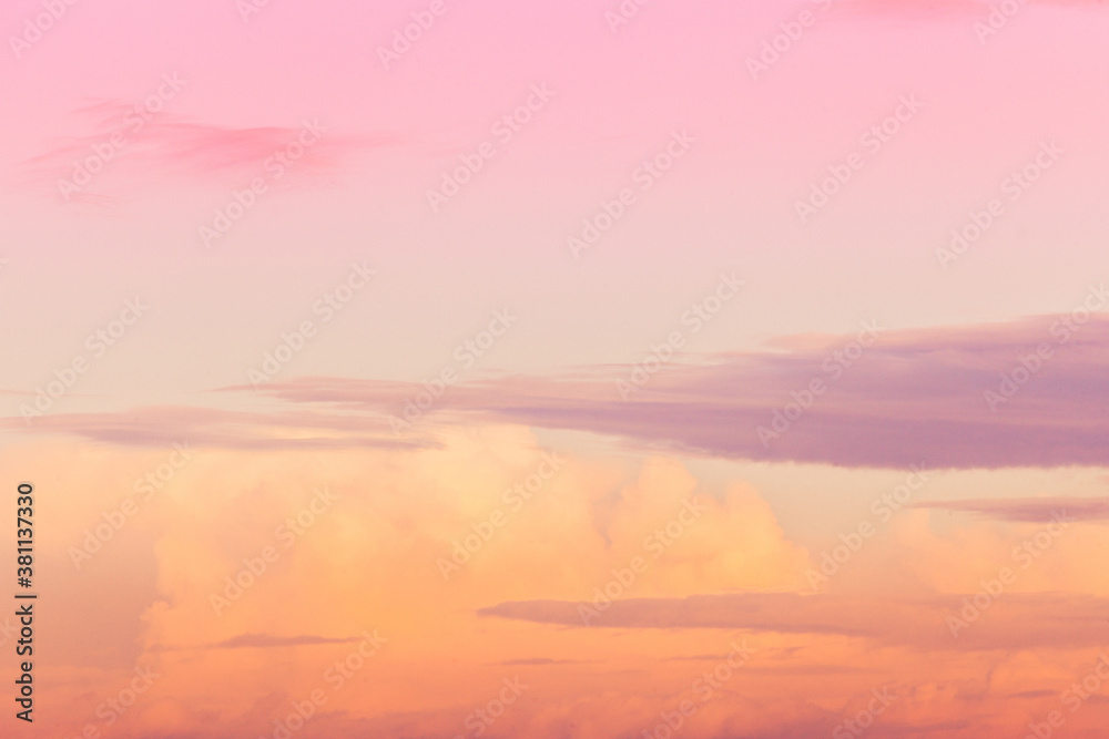 orange and pink sky with clouds at sunset background