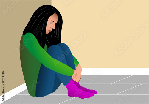 Chica deprimida sentada en el suelo de su habitación agarrándose las rodillas