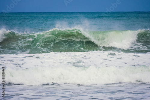 Powerful blue ocean wave with perfect breaking natural background