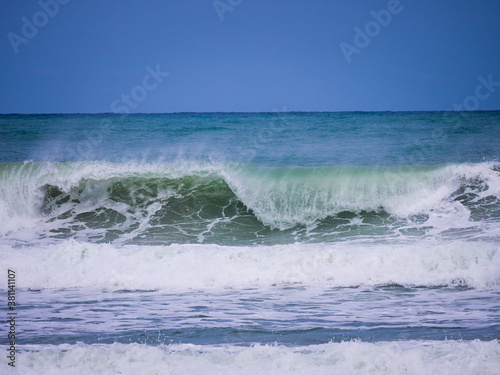 Powerful blue ocean wave with perfect breaking natural background