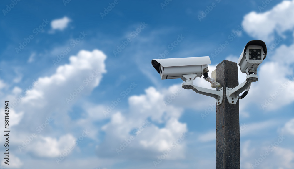 Outdoor Security CCTV cameras on blue sky background . Outdoor Security CCTV cameras on blue sky background .