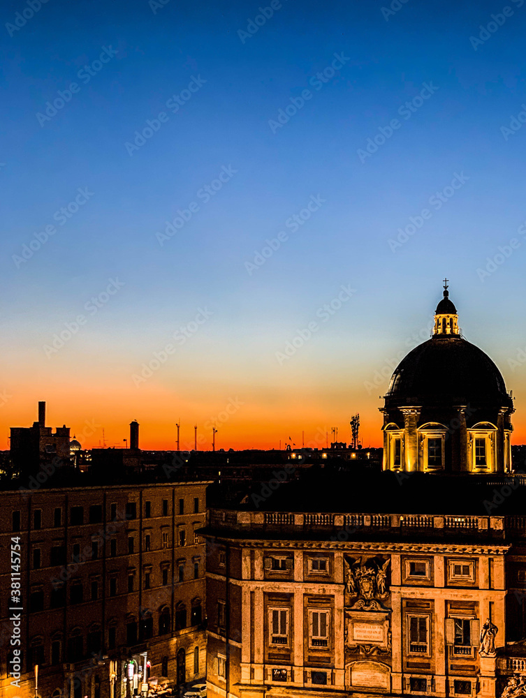 Rome, Italy; August 27, 2019. Sunset from the heights with ancient buildings behind.