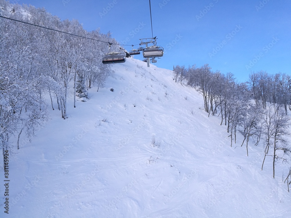 Skiing under a blue sky in the beautiful ski resort of Åre (Aare) Sweden Skiing under a blue sky in the beautiful ski resort of Åre (Aare) Sweden