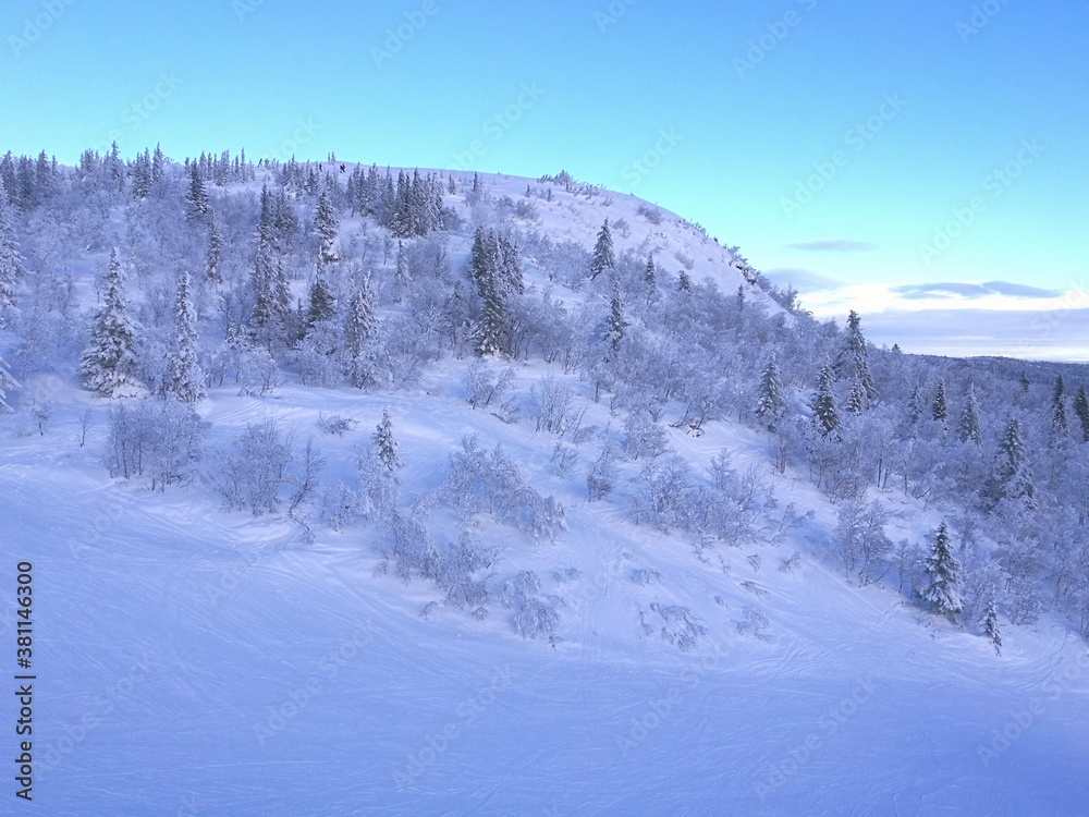Skiing under a blue sky in the beautiful ski resort of Åre (Aare) Sweden