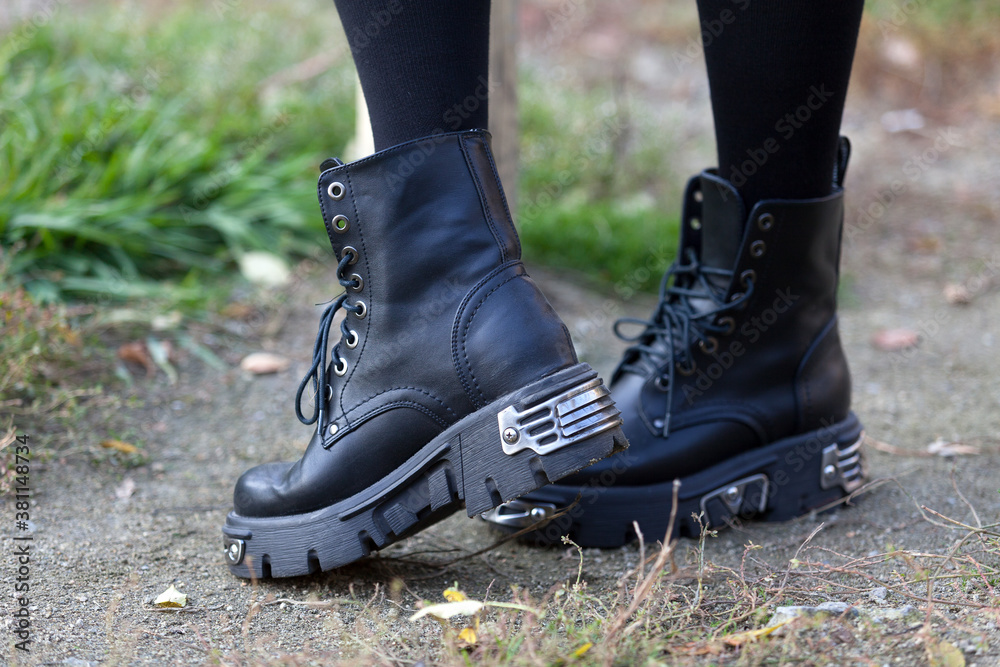 Black boots on female legs