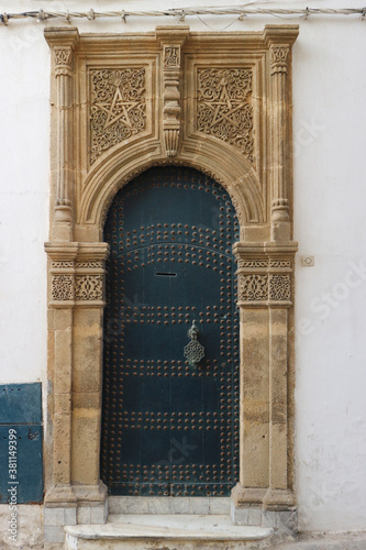 Traditional beautiful door in Tangier, Morocco. Typical moroccan architecture. © Serhii