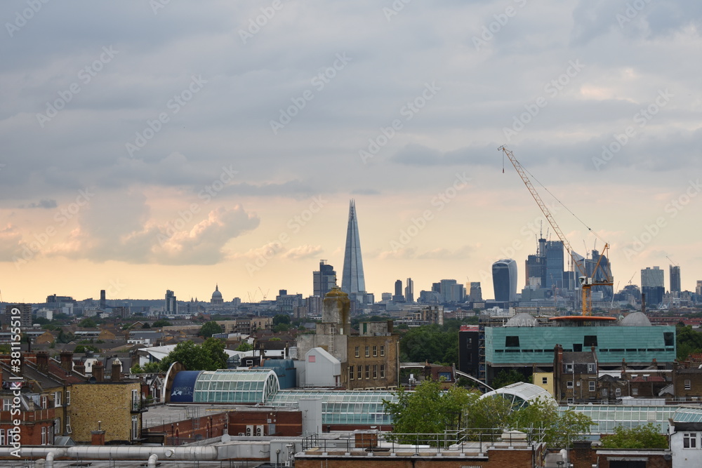 View of the London skyline on a cloudy day as seen from Peckham with The Shard in the middle and construction work in the foreground View of the London skyline on a cloudy day as seen from Peckham with The Shard in the middle and construction work in the foreground