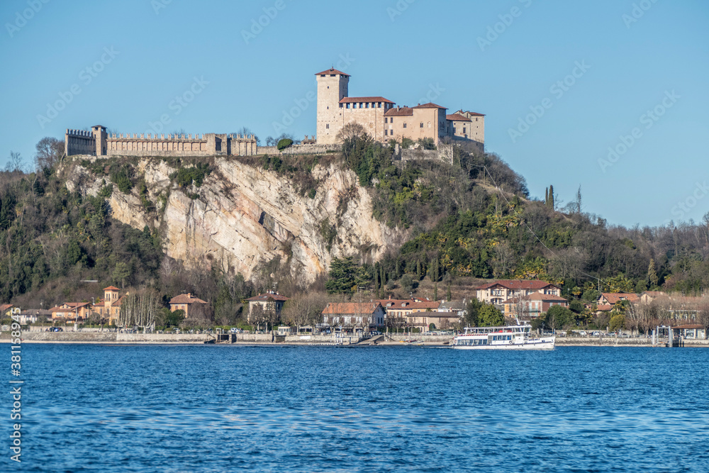 Landscape of the castle of Angera and the city with a boat
