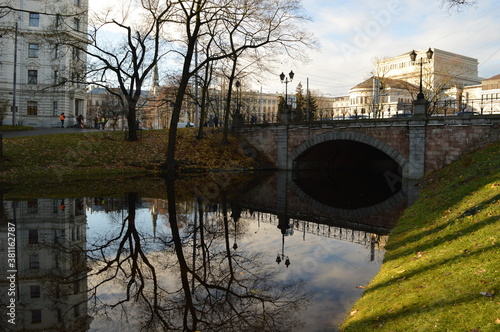 Stunning autumn landscape, colors and water reflections in Riga, Latvia photo