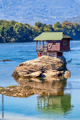 Drina river with famous house on the rock photo
