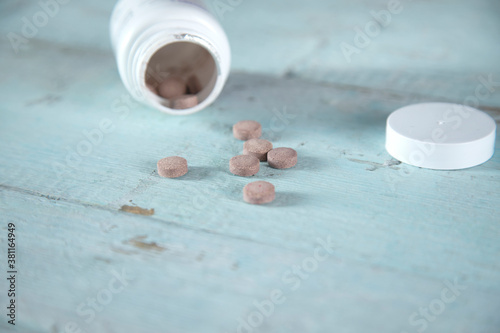 medical pills out of a drug bottle