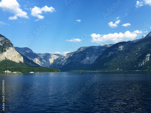 landscape of lake and mountains against blue sky at sunny day in Hallstatt Upper Austria