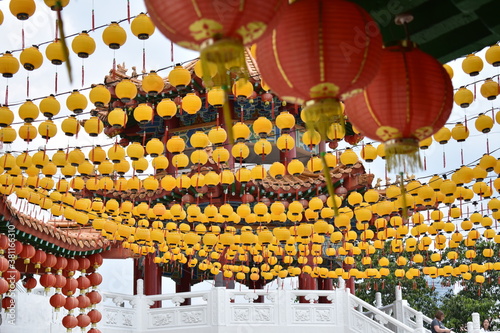 Photography Colorful rows of yellow lanterns at a temple near Kuala Lumpur, Malaysia