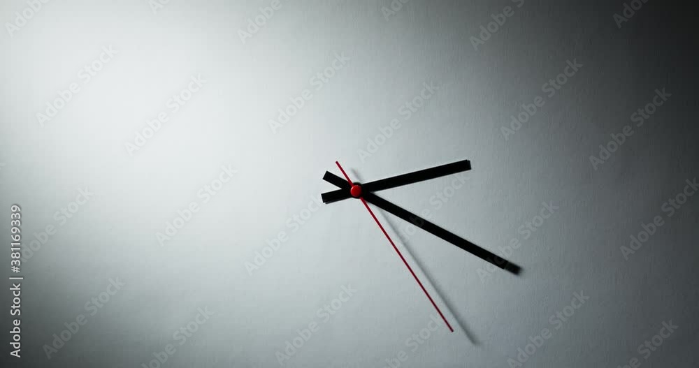 The hands of a wall clock moving fast. Timelapse.