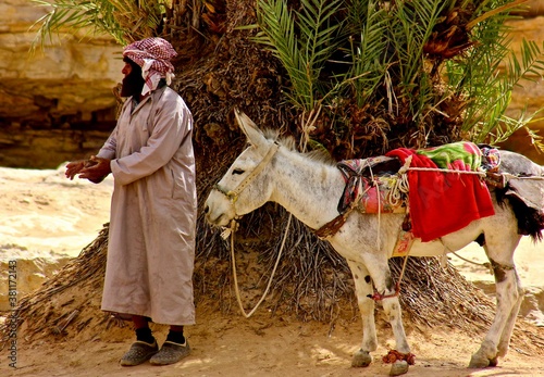 Valokuva Bedouin man with donkey