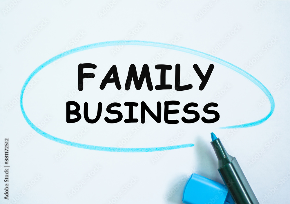 Check list and marker. Definition of the word FAMILY BUSINESS highlighted with with a marker. partial focus Check list and marker. Definition of the word FAMILY BUSINESS highlighted with with a marker. partial focus