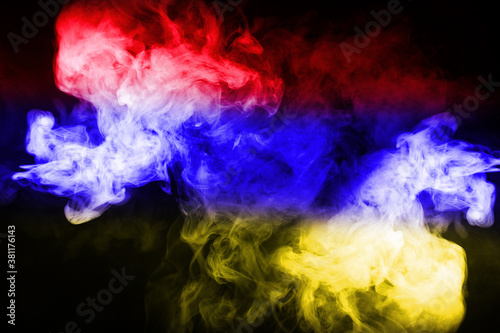 Armenia flag in smoke. The concept of an armed conflict. Smoke texture.