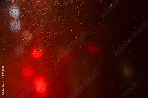 Behind the mirror when it rains with beautiful lights
