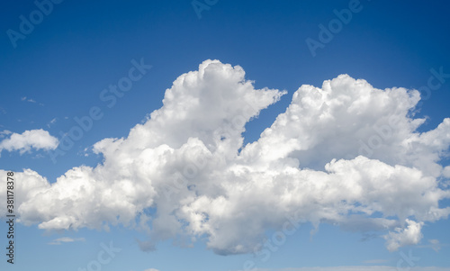 Horizontal white cloud against blue sky background