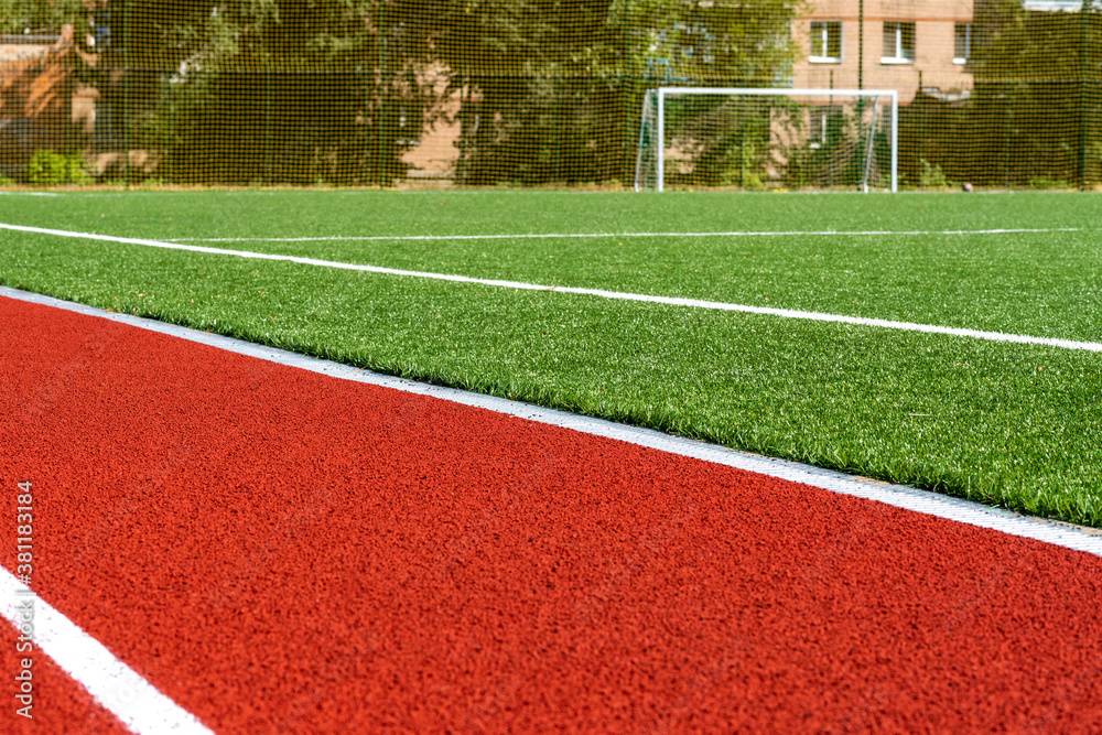 Fototapeta premium soccer gates. Football goal at the stadium. Football field with artificial lawn. Concept other party of soccer. At stadium.