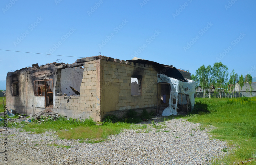 scars of war and conflict, a ruined building, a house scars of war and conflict, a ruined building, a house