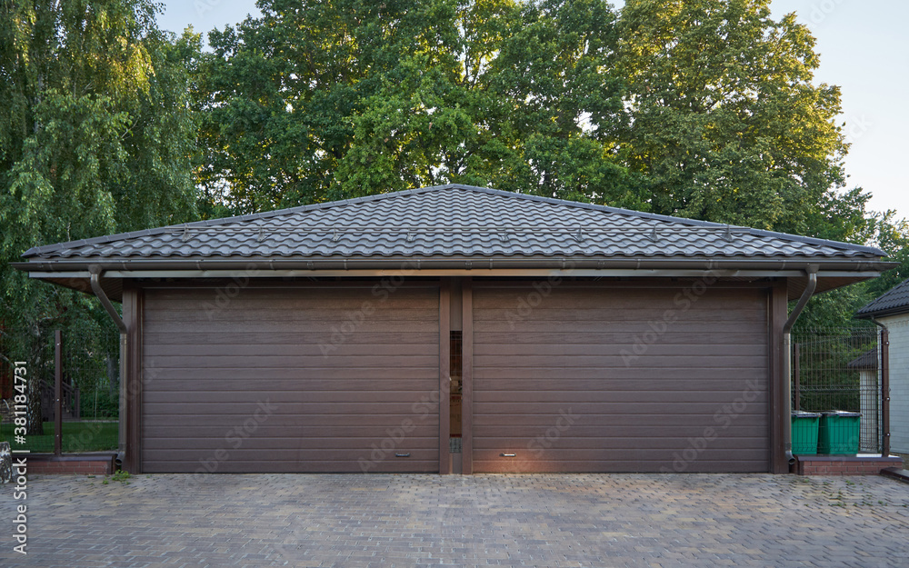 Modern garage and automatic garage door for two cars Modern garage and automatic garage door for two cars