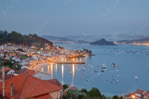 Aerial view at sunset of a coastal town in the Galicia area called Rax  