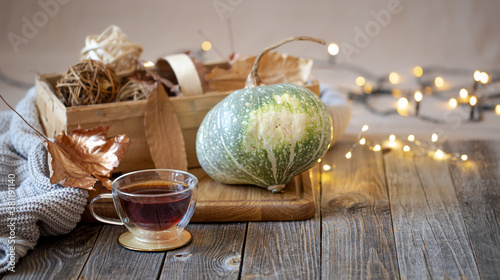 Cozy still life with tea and decorative items