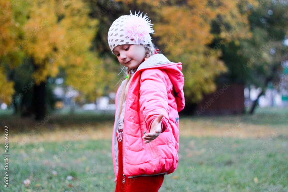 girl in red clothes posing on the background of nature girl in red clothes posing on the background of nature
