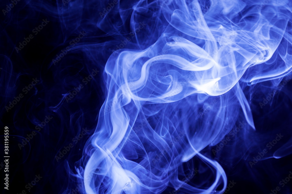 Blue smoke on black background