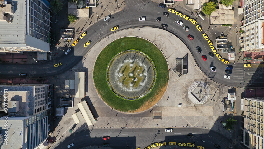 Aerial drone photo of recently renovated Omonoia square featuring huge round fountain, Athens centre, Attica, Greece