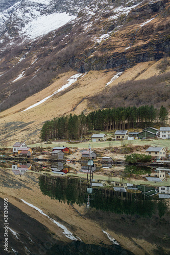 Norwegian fjord, village and mountains in winter. Mountain rural landscape view, Flam, Norway