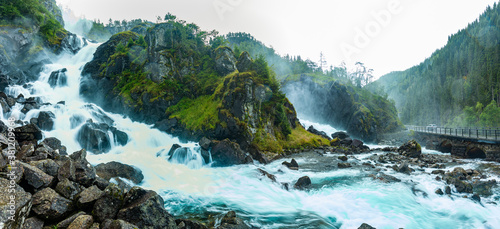 Latefossen waterfall in Hordaland, Norway. Old stone bridge. photo