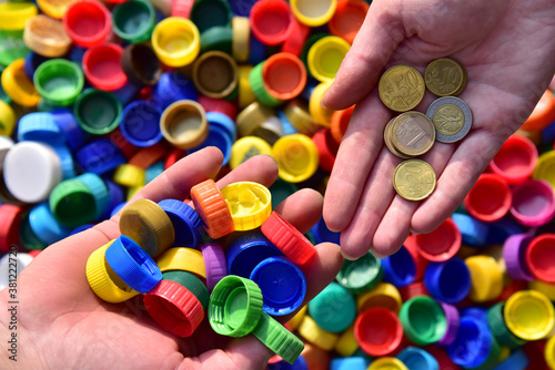 Recycling Lids From Plastic Bottles for money. Cap material is recyclable. Get paid for plastic recycling. Cash from trash. Waste plastic bottle caps for recycling.