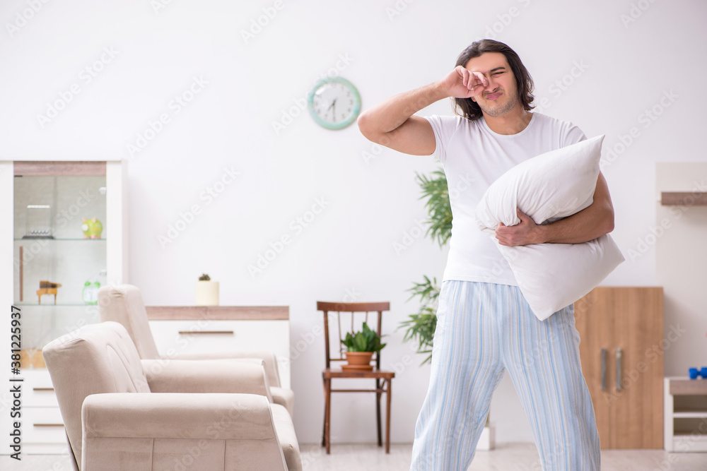Young male starting day with morning exercises Young male starting day with morning exercises