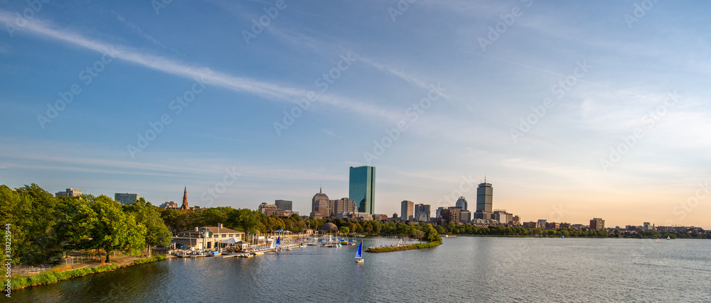 Panoramic view of Boston downtown and historic center from the landmark Longfellow bridge over Charles River .