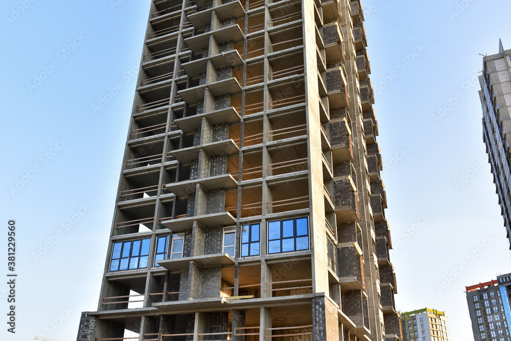 Construction of skeleton erection of multi-storey building. High-rise ...