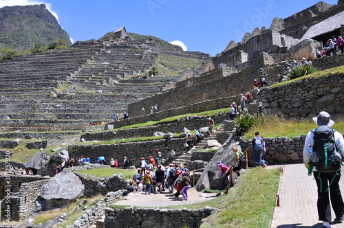 View of the crowds of tourists inside the city of Machu Picchu, the lost city of the Incas in Peru