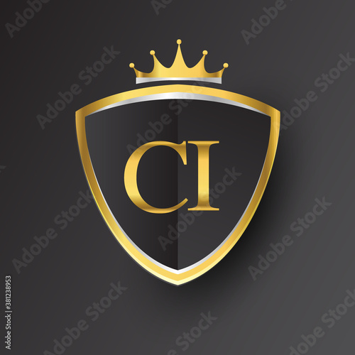 Initial logo letter CI with shield and crown Icon golden color isolated on black background, logotype design for company identity.