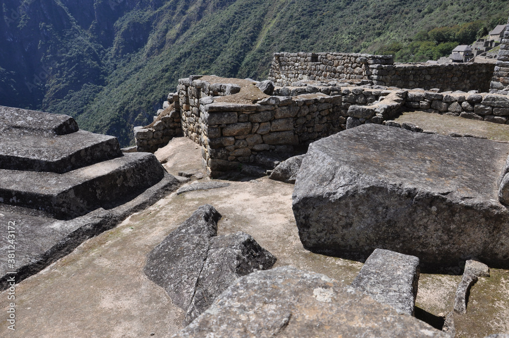 A close up view of the stone buildings and ruins inside the ancient Incan city of Machu Picchu