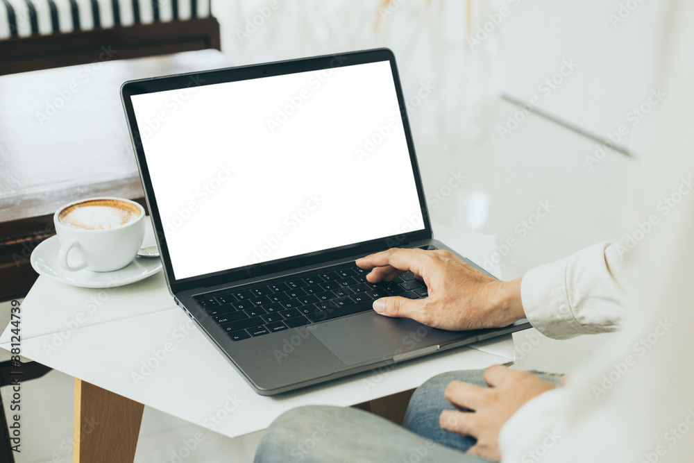 computer mockup blank screen.hand woman work using laptop with white background for advertising,contact business search information on desk at coffee shop.marketing and creative design